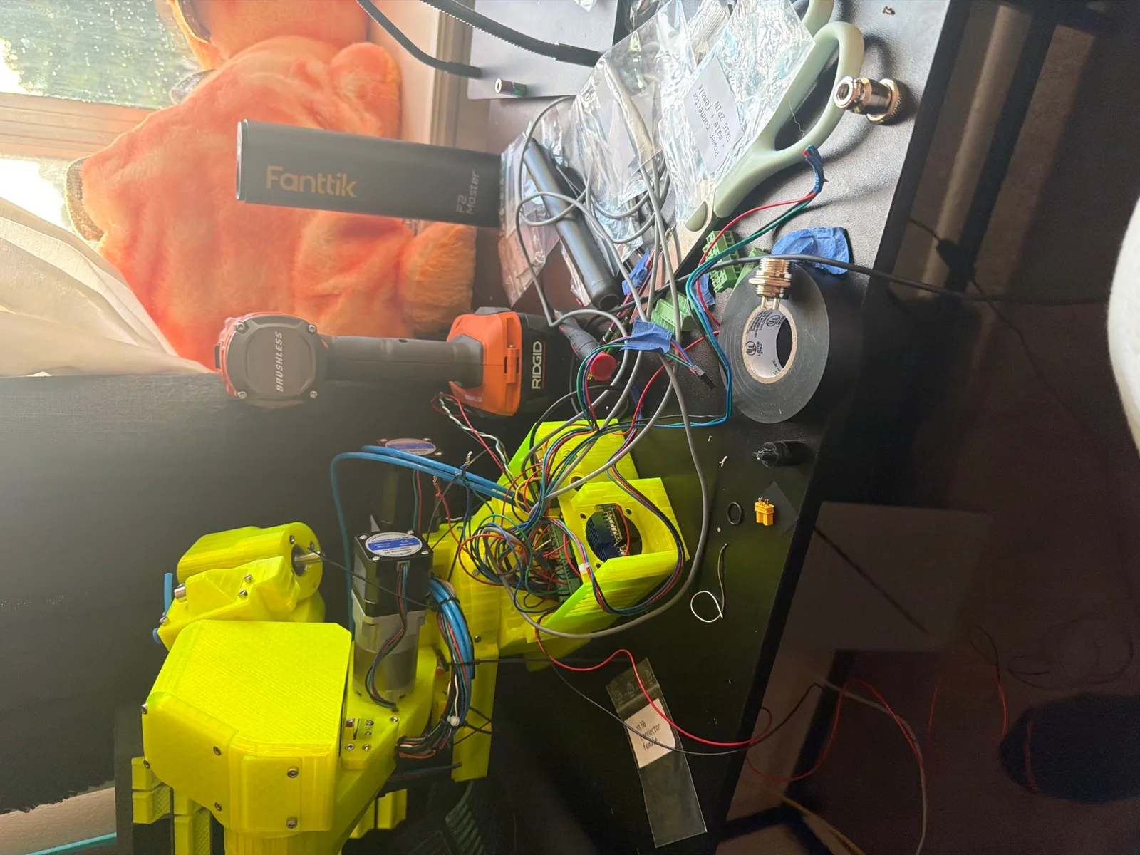 VOLT partially assembled with its wiring loom being routed through the frame