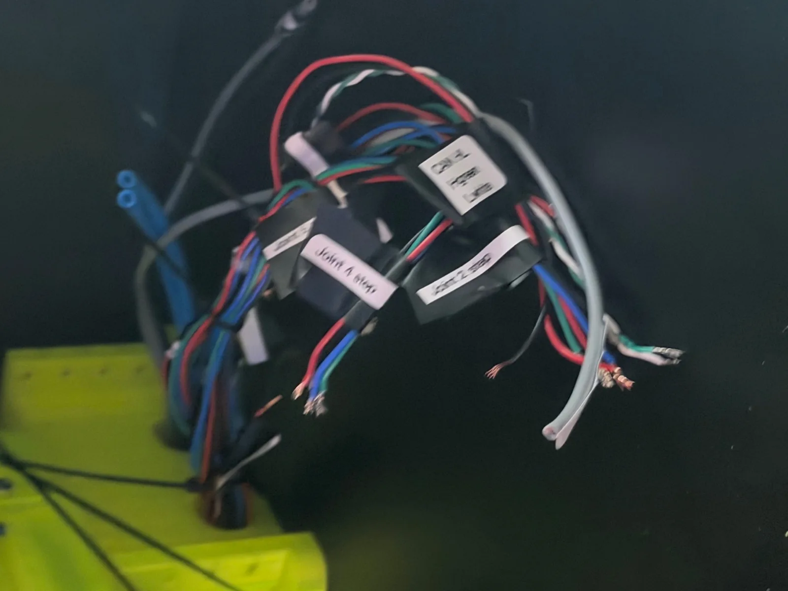 A wiring harness laid out and labelled per joint before installation