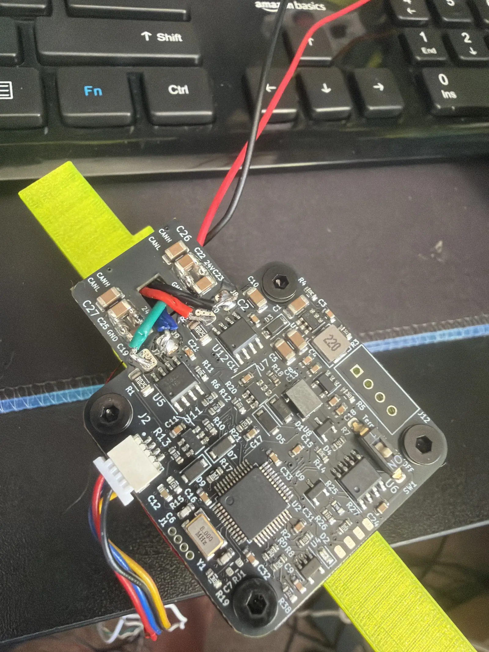 The assembled gripper control board mounted to its printed carrier